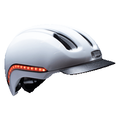 Nutcase Vio Blanco Gloss Adult helmet with MIPS, 200 lumens front LED headlight ,65 lumens side and rear LED lights, reflective print, magnetic buckle for easy on and off, dial adjustable for individualized fit and comfort, duo layer foam construction with denser outer layer and softer inner layer, and removable visor
