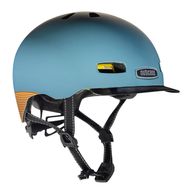 Nutcase Stree Collection Blue Steel Adult helmet with industry leading safety feature MIPS, reflective print, magnetic buckle for easy on and off, Internal heat sealed pads to provide comfort, dial adjustable fit system for individualized fit and comfort, and removable visor.