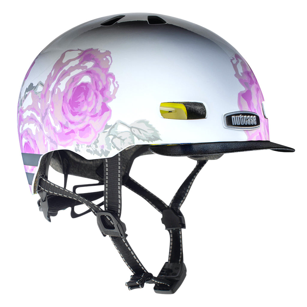 Nutcase Street Collection Delicate Flower Adult  helmet with industry leading safety feature MIPS, reflective print, magnetic buckle for easy on and off, Internal heat sealed pads to provide comfort, dial adjustable fit system for individualized fit and comfort, and removable visor.